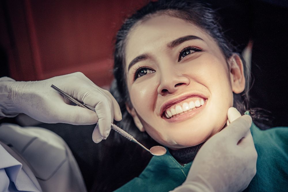 a women is getting dental treatment